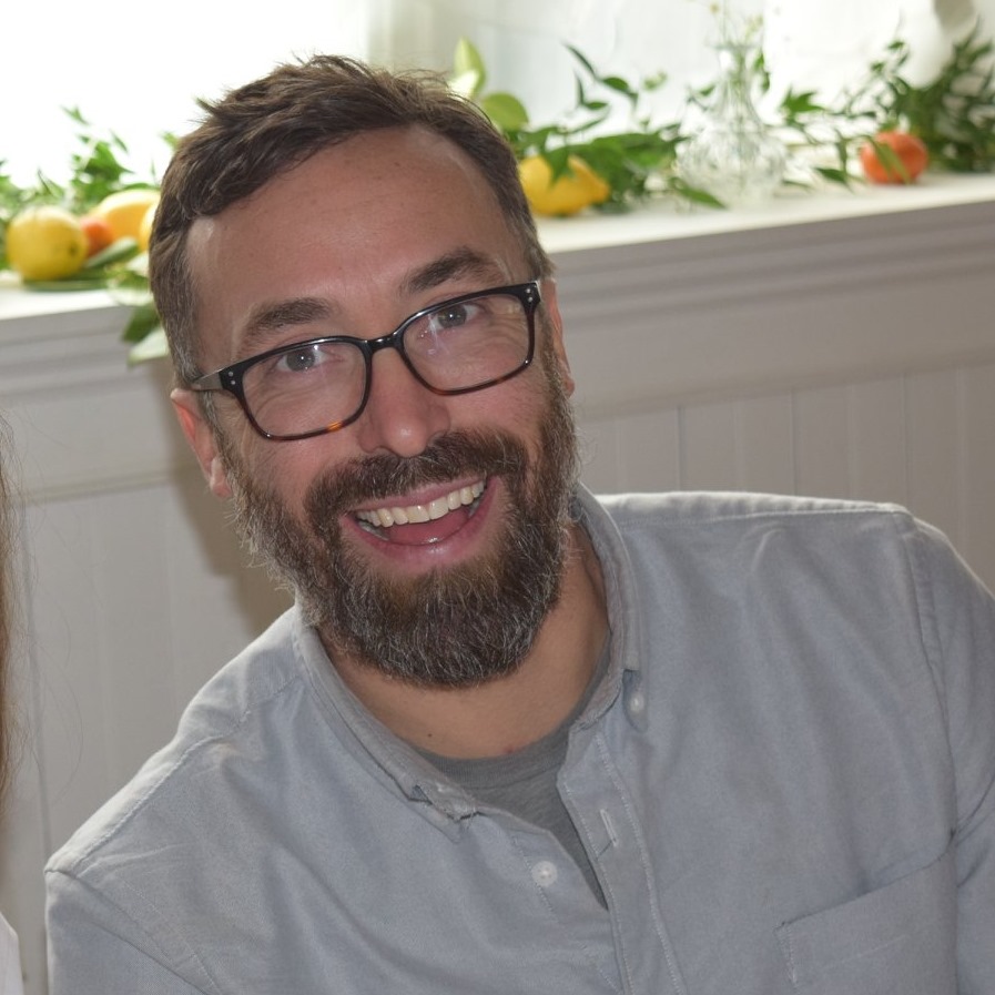 Smiling man wearing glasses